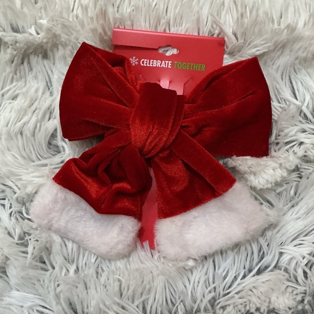 Celebrate Together oversized red velvet bow hair clip with white trim